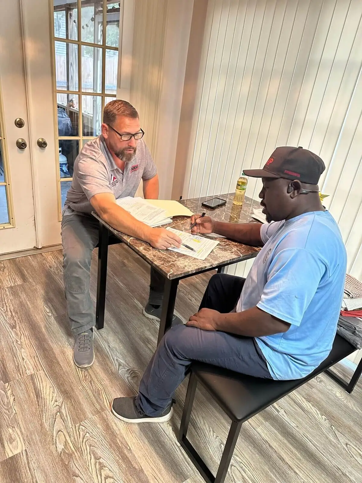 Roofing consultation in Columbia SC with SCC Roofing team member providing project guidance